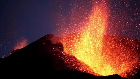 Volcano erupting spewing lava into the air. Stock Footage