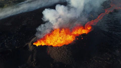 Volcano Eruption, Flowing Red Hot Lava Erupts from Crater, Iceland Stock Footage 320375067