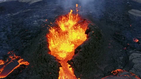 Volcano Eruption in Iceland Aerial, drone flying away from erupting volcano Stock Footage