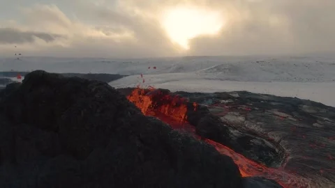 Volcano Eruption Lava Spatter Fire &amp; Ice Snow Landscape Sun 스톡 동영상 322181199