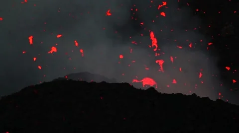 Volcano eruption, lava splash at night Stock Footage 53321020