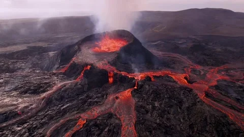 Volcano Eruption at Sunset Drone Flies Dangerously Close to Magma Flowing Lava Stock Footage 257101581