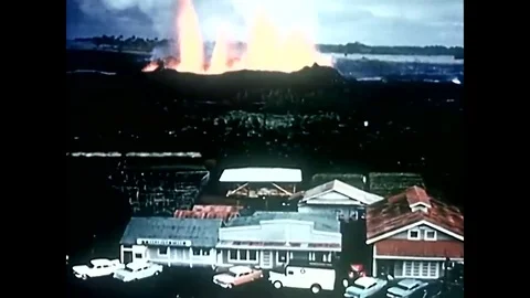 As the volcano erupts in Kapoho, in Lower Puna, Hawaii, homes crop fields are Stock Footage 79513758