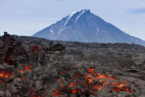 Volcano exploding in the day Stock Photos