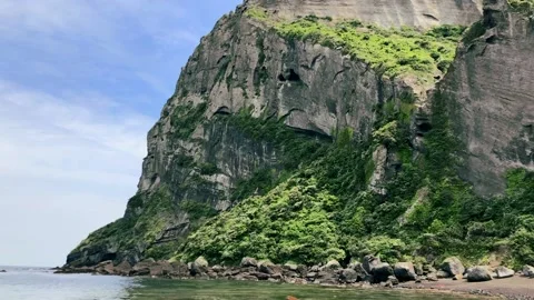 The volcano Ilchulbong. Bottom view. Jeju island, Korea Stock Footage 145366121