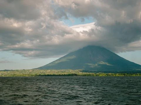 Volcano on an island Stock Photos
