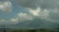 Volcano lake and landscape with thick grey clouds HD Footage