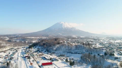 Volcano Landscape, Drone Reveals Mountain Town and Bright Yellow bridge Stock Footage