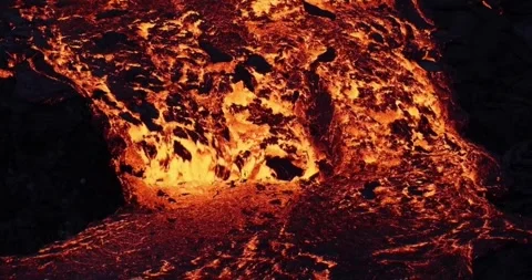 Volcano lava flow eruption fire geology smoke volcanic mountain magma Video stock 336580076