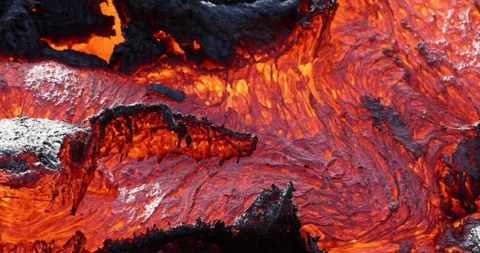 Volcano lava flow eruption fire geology smoke volcanic mountain magma Video stock 336580079
