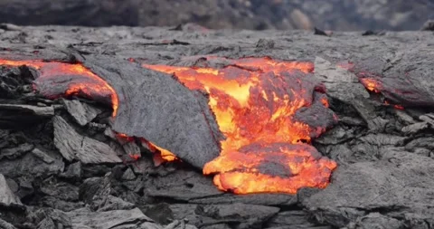Volcano lava flow eruption fire geology smoke volcanic mountain magma Video stock 336580107