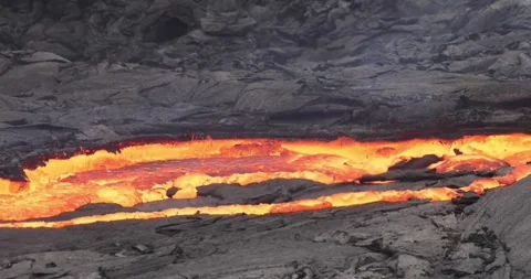 Volcano lava flow eruption fire geology smoke volcanic mountain magma Stock Footage 336580179