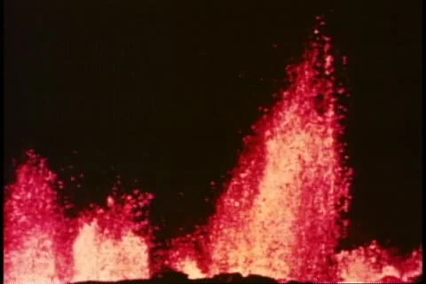 Volcanoes on the Big Island of Hawaii erupting at night, medium shot Stock Footage