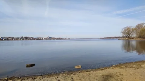 Volga River coast in early spring. Russia, Kostroma. Wide, calm river with 스톡 동영상 307707740