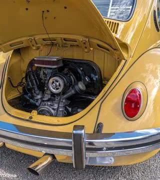 Volkswagen Beetle engine showcase at classic car exhibition Stock Photos
