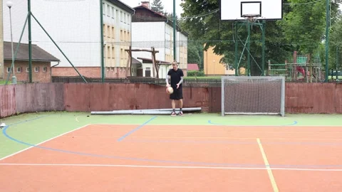 Volleyball beach player practicing his serve Stock Footage 278468675