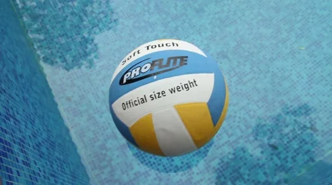 Volleyball floating on a pool Stock Footage 974890