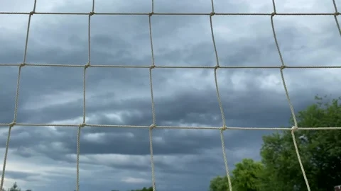 Volleyball net on the background of a cloudy sky. White net, play volleyball Stock Footage 247769957