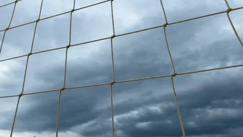 Volleyball net on the background of a cloudy sky. White net, play volleyball Stock Footage 247770183