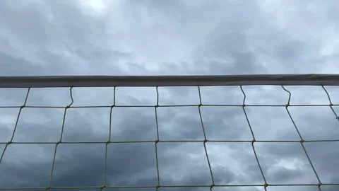 Volleyball net on the background of a cloudy sky. White net, play volleyball Stock Footage 247770184