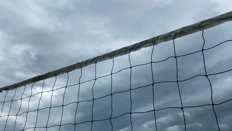 Volleyball net on the background of a cloudy sky. White net, play volleyball Stock Footage 247770204