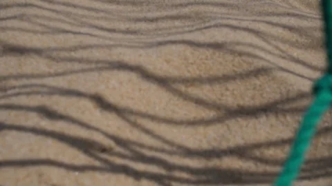 Volleyball net on the sand background. close-up . Shadow from the net Stock Footage 280702773