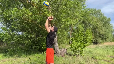 Volleyball player practicing serves in a sequence of six frames Stock Footage 282515270