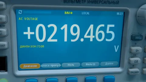 Voltage measurement data with high accuracy on the screen of universal voltmeter Stock Footage 188072604