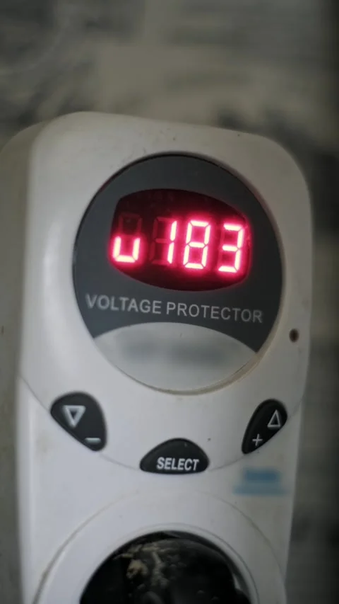 Voltage Protector Showing Low Voltage on Digital Display Stock Footage 320353693