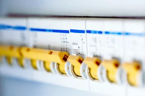 Voltage switchboard with circuit breakers are are in the ON position in the Stock Photos