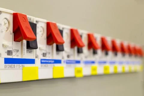 Voltage switchboard with circuit breakers. Electrical background Stock Photos