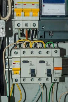 Voltage switchboard with circuit breakers. Electrical background Stock Photos