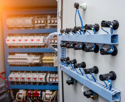 Voltage switchboard with circuit breakers. Modern electrical background Stock Photos