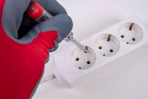 Voltage testing with red gloves Stock Photos