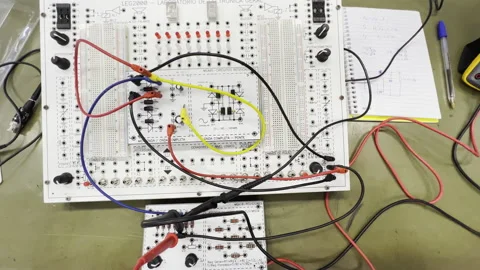 Voltmeter Measuring Electric Current On Electronic Breadboard Circuit Stock Footage 172240269
