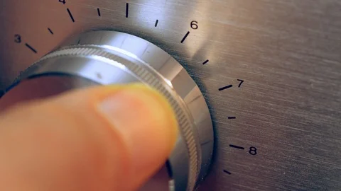 Volume knob on subwoofer audio amplifier Stock Footage 99871960