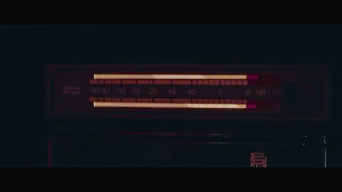 Volume meter displaying a moving decibels on an analogue machine Stock Footage 254764668