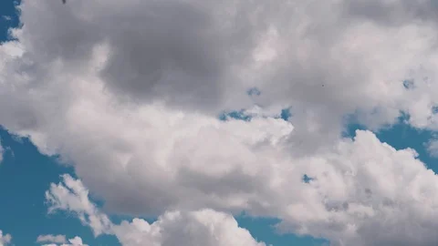 Volumetric clouds fly in the sky Stock Footage 128962804