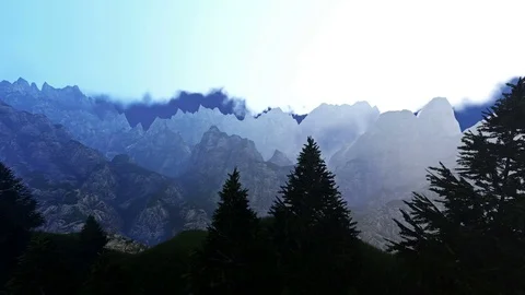 Volumetric Clouds Flying over the Mountain Peaks Stock Footage 77714834