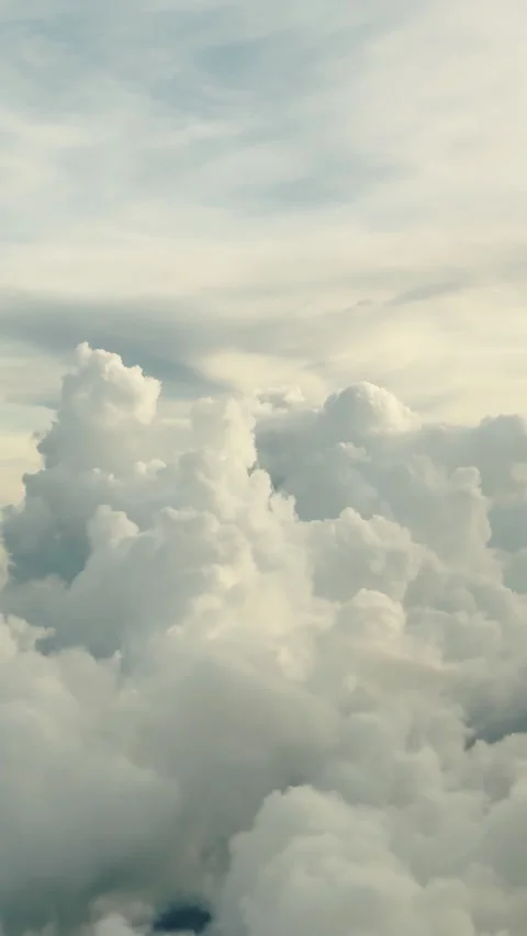 Volumetric white clouds pattern in vivid sky background Stock Footage 347020555