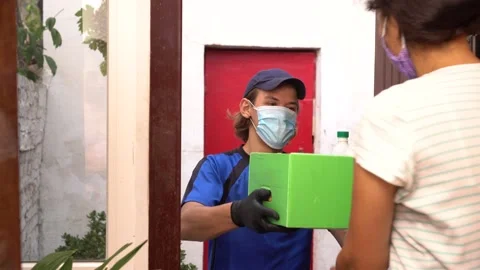 Volunteer During COVID-19. Sorting and packing. Assembling boxes of food Stock Footage 139556007