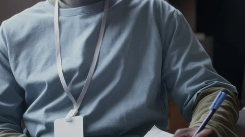 Volunteer Filling Documents Working at Office Stock Footage 310351900