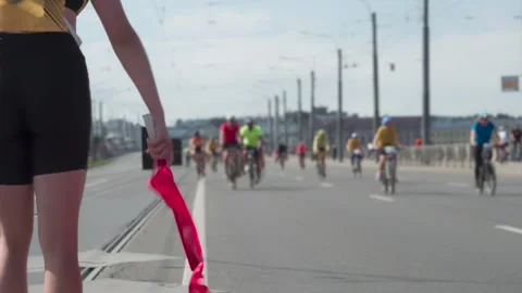 Volunteer Helping Cyclists 4K Video stock 252394712
