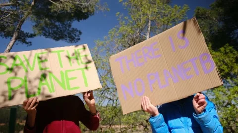 Volunteer kids with Save the planet Poster Stock Footage 238401774