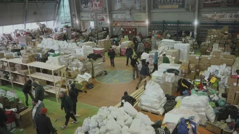 Volunteer work at humanitarian aid warehouse. 2023. Chernivtsi Ukraine. Stock Footage 237702559