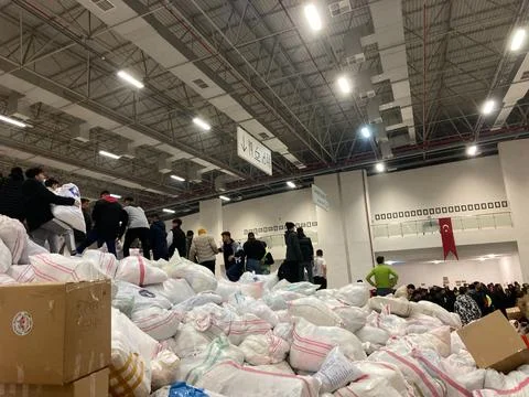Volunteers Loading Supply Trucks to Help Earthquake Victims Stock Photos