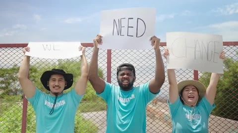 Volunteers protesting against garbage pollution staying at dumps city outskirts Stock Footage 204835179