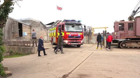 A Volvo modern fire engine on location by a river responding to a emergency 動画素材 188500539