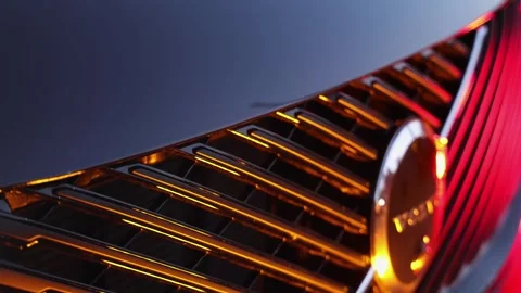 Volvo XC90 front grille and logo close up nicely illuminated tilt down 4K Stock Footage 342589699