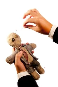 Voodoo doll isolated on white Stock Photos